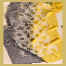 Mixture of grey and yellow embroidery style scarf