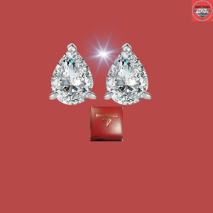 Pear shaped simulated diamonds set on 925 sterling silver with platinum