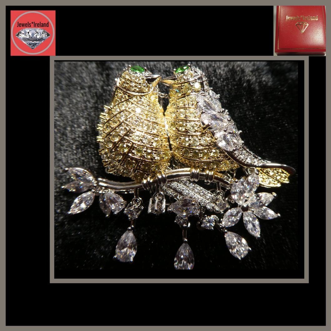 Beautiful brooch birds with shades of citrine.