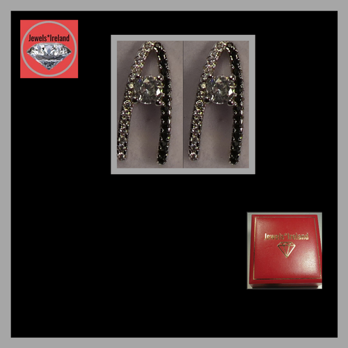 Illustrating letter A earrings.