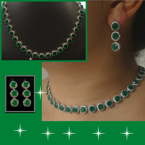 Emerald and diamond stunning lab created necklace and earrings.