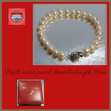 Fresh water pearl bracelet silver flower clasp