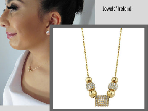 Gold charm barrel design necklace with pave stones