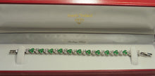 Elegant bracelet man made diamonds & created emeralds