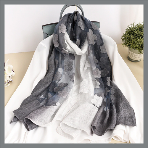 Mixture of grey and white embroidery style scarf